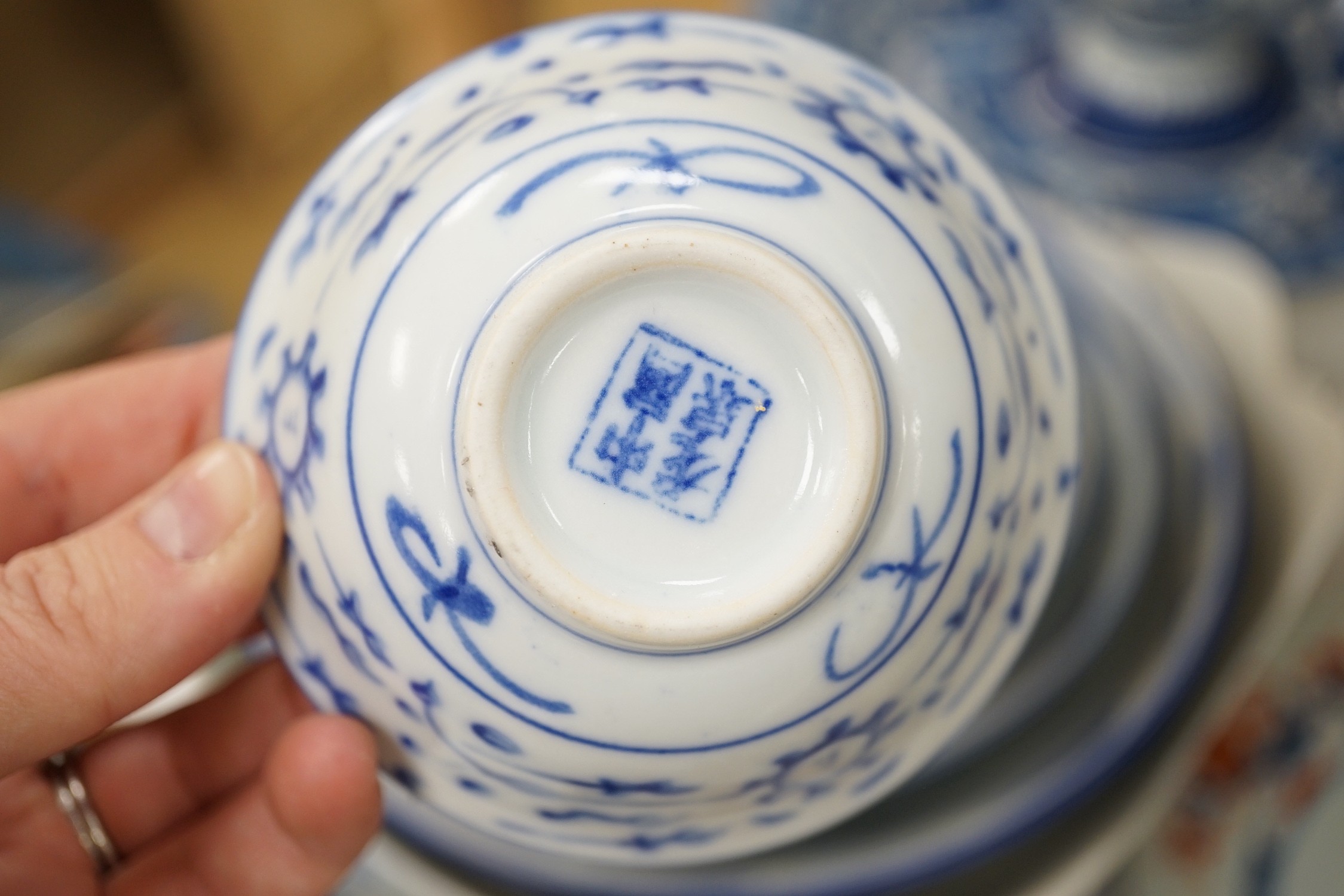 An assortment of Chinese porcelain tin-glazed earthenware charger and a Delft vase
